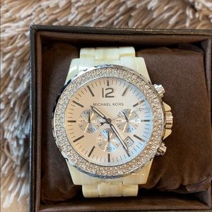 Michael kors watch original tag in the box.